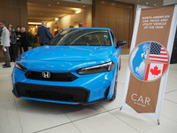 The Honda Civic Hybrid, which was chosen North American Car of the Year for 2025, in Detroit, Michigan, on Friday