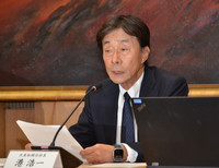 Fuji Television President Koichi Minato speaks at a press conference in Tokyo on Friday.