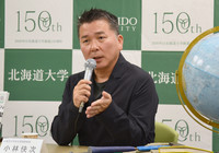 Yoshitsugu Kobayashi, professor at Hokkaido University, speaks about a crowdfunding campaign for dinosaur fossil excavations, in a press conference in Tokyo's Chiyoda Ward on Dec. 18, 2024.