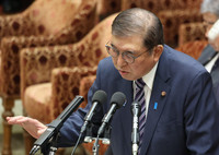 Japanese Prime Minister Shigeru Ishiba speaks at a parliamentary committee meeting in Tokyo on Monday.