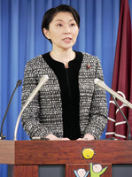 Yuko Obuchi, head of the Japanese ruling Liberal Democratic Party's Party Organization and Campaign Headquarters, announces a draft of the LDP's polity platform for 2025 in a press conference at the party headquarters in Tokyo on Friday.