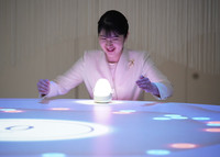 Japan's Princess Aiko visits the Electric Power Pavilion at the Osaka Expo on Thursday. (Pool photo)