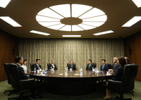 Bank of Japan Governor Kazuo Ueda (center) attends a policy-setting on May 1. (Pool photo)
