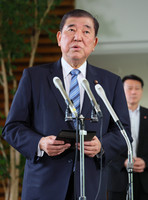 Prime Minister Shigeru Ishiba speaks to the press after telephone talks with U.S. President Donald Trump, in Tokyo on Friday.