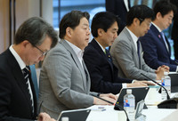 Chief Cabinet Secretary Yoshimasa Hayashi (second from left) speaks at a meeting of the government's Cybersecurity Strategic Headquarters at the prime minister's office on Thursday.