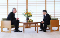 Japan's Emperor Naruhito (right) meets with Lithuanian President Gitanas Nauseda at the Imperial Palace in Tokyo on Monday. (Pool photo)