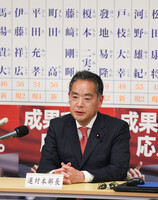 Shinji Inoue, head of the LDP's Tokyo chapter speaks to reporters at the party headquarters on Sunday.