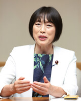 JCP chief Tomoko Tamura speaks in an interview in Tokyo on Friday.