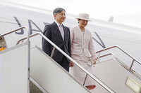 Emperor Naruhito and Empress Masako arrive at Chinggis Khaan International Airport in Mongolia on Sunday. (Pool photo)