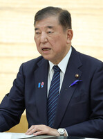Japanese Prime Minister Shigeru Ishiba speaks about U.S. tariffs at a government meeting at the prime minister's office in Tokyo on Tuesday.