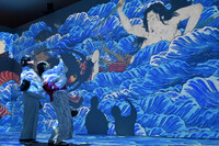 Visitors explore a preview of the
