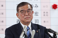 Japanese Prime Minister Shigeru Ishiba speaks at the Liberal Democratic Party headquarters in Tokyo on Sunday.