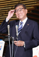 Japanese Prime Minister Shigeru Ishiba speaks to reporters at his office in Tokyo on Thursday.