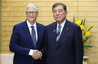 Japanese Prime Minister Shigeru Ishiba (right) meets with Microsoft co-founder Bill Gates, head of the Gates Foundation, at the prime minister's office in Tokyo on Tuesday.