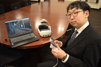 Daiki Hama, a lecturer at Tama University, speaks in an interview at the school in Tama, Tokyo, on April 18, discussing his experience of creating, as a teaching material, a digital Siberian internment camp using a virtual reality technology.