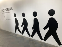 The entrance of the pictogram exhibition modeled after The Beatles' album cover, in London on July 28